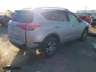 2017 Toyota RAV4 LE with VIN 2T3ZFREV3HW325229, listed as a IAAI auction lot 41290488 with 156,243 mi miles. Bid and sale history available at carsss.com. Image 4.