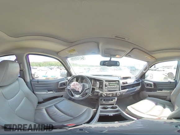 2014 Honda Ridgeline RTL with VIN 5FPYK1F57EB002835, listed as a Copart auction lot 54748905 with 111,253 mi miles and Salvage title. Bid and sale history available at DreamBid. Image 14.