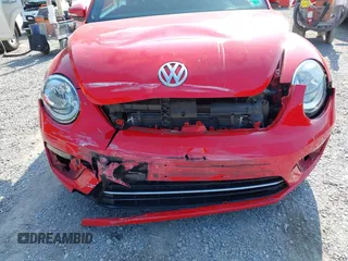 2019 Volkswagen Beetle S with VIN 3VW5DAAT7KM510898, listed as a IAAI auction lot 42567677 with Not provided miles and . Bid and sale history available at DreamBid. Image 6.