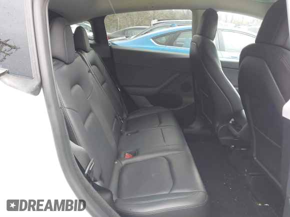 2023 Tesla Model Y Long Range z VIN 7SAYGDEE4PF621640, wystawiony jako IAAI lot #41796502 z przebiegiem 68 484 mil mil oraz . Historia ofert i sprzedaży dostępna na DreamBid. Obrazek 8.