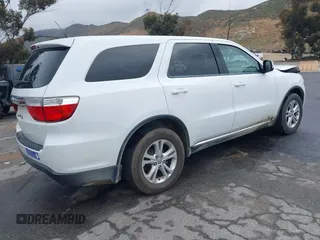 2013 Dodge Durango SXT z VIN 1C4RDHAG7DC694986, wystawiony jako IAAI lot #42181381 z przebiegiem 170 669 mil mil oraz . Historia ofert i sprzedaży dostępna na DreamBid. Obrazek 4.
