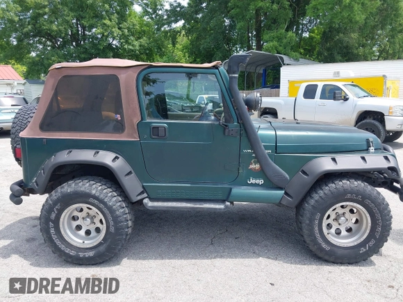 2000 Jeep Wrangler Sahara with VIN 1J4FA59S8YP722208, listed as a IAAI auction lot 42294978 with 238,024 mi miles and . Bid and sale history available at DreamBid. Image 13.