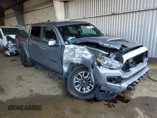 2021 Toyota Tacoma SR with VIN 3TMCZ5AN6MM393306, listed as a Copart auction lot 41483325 with 57,217 mi miles and Salvage title. Bid and sale history available at DreamBid. Image 4.