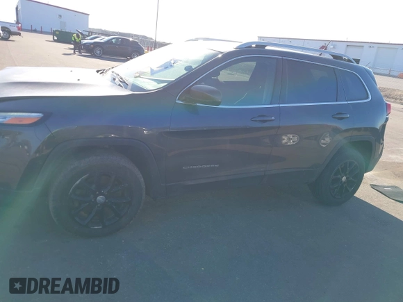 2016 Jeep Cherokee Latitude with VIN 1C4PJMCB8GW162224, listed as a IAAI auction lot 41847908 with 141,642 mi miles and . Bid and sale history available at carsss.com. Image 14.