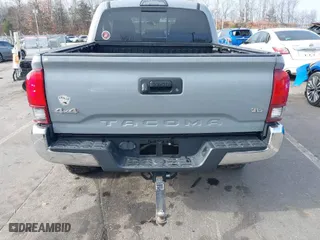 2019 Toyota Tacoma 4WD SR with VIN 3TMCZ5AN4KM204455, listed as a IAAI auction lot 41223185 with 77,144 mi miles. Bid and sale history available at carsss.com. Image 16.