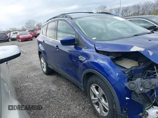 2016 Ford Escape SE z VIN 1FMCU9G99GUC32802, wystawiony jako IAAI lot #41958414 z przebiegiem 131 962 mil mil oraz . Historia ofert i sprzedaży dostępna na DreamBid. Obrazek 13.