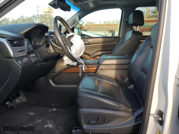 2017 Chevrolet Tahoe Premier with VIN 1GNSCCKC9HR177850, listed as a Copart auction lot 43327575 with 106,389 mi miles and Salvage Title. Bid and sale history available at carsss.com. Image 7.