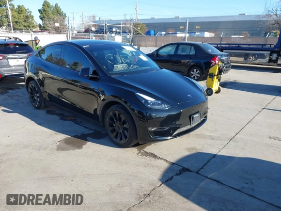 2024 Tesla Model Y Long Range with VIN 7SAYGDEEXRF983040, listed as a IAAI auction lot 41555332 with 79,506 mi miles and . Bid and sale history available at DreamBid. Image 1.