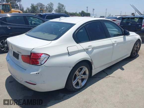 2014 BMW 3 Series 328i with VIN WBA3C1C59EK111396, listed as a IAAI auction lot 42471040 with 182,636 mi miles and . Bid and sale history available at DreamBid. Image 4.