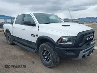 2017 Ram 1500 Rebel z VIN 1C6RR7YT8HS691774, wystawiony jako IAAI lot #42139684 z przebiegiem 62 497 mil mil oraz . Historia ofert i sprzedaży dostępna na DreamBid. Obrazek 1.