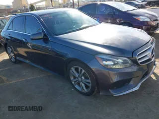 2014 Mercedes-Benz E-Class E 250 BlueTEC Luxury with VIN WDDHF0EB0EA876408, listed as a IAAI auction lot 41614679 with 283,695 mi miles. Bid and sale history available at carsss.com. Image 1.