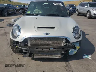 2012 MINI Convertible S z VIN WMWZP3C51CT296464, wystawiony jako Copart lot #64290005 z przebiegiem 107 580 mil mil oraz Szkoda całkowita • Salvage title. Historia ofert i sprzedaży dostępna na DreamBid. Obrazek 5.