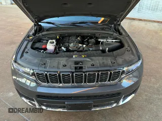 2023 Jeep Grand Cherokee Limited z VIN 1C4RJKBG4P8840711, wystawiony jako Copart lot #56185315 z przebiegiem 8 076 mil mil oraz Szkoda całkowita • Salvage title. Historia ofert i sprzedaży dostępna na DreamBid. Obrazek 13.