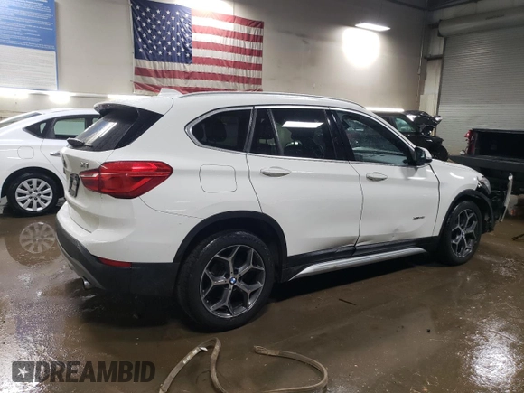 2016 BMW X1 xDrive28i with VIN WBXHT3C3XG5E51117, listed as a Copart auction lot 48243355 with 129,607 mi miles and Salvage Title. Bid and sale history available at carsss.com. Image 3.