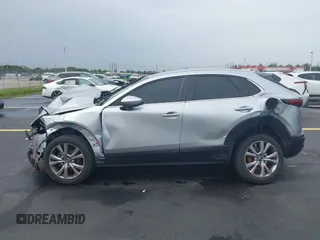 2021 Mazda CX-30 Select with VIN 3MVDMBBLXMM246600, listed as a IAAI auction lot 42418629 with 77,713 mi miles and . Bid and sale history available at DreamBid. Image 13.