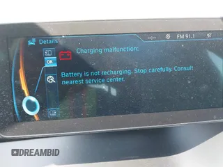 2014 BMW i3 with VIN WBY1Z2C55EV284358, listed as a IAAI auction lot 42597996 with 48,233 mi miles and . Bid and sale history available at DreamBid. Image 13.