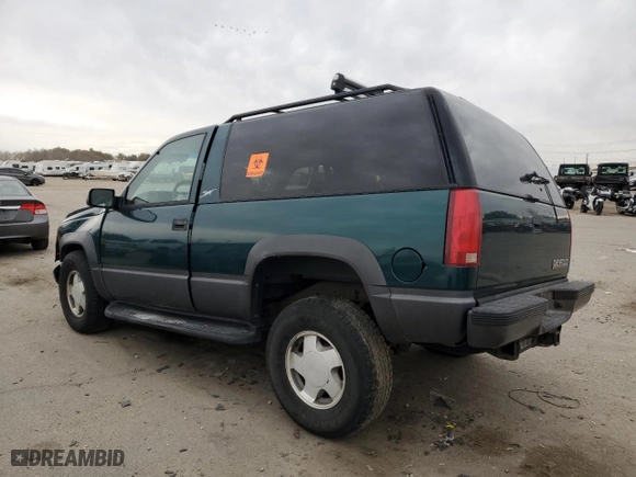 1998 Chevrolet Tahoe with VIN 3GNEK18R4WG128424, listed as a Copart auction lot 79684984 with 217,456 mi miles and Salvage Title. Bid and sale history available at carsss.com. Image 2.