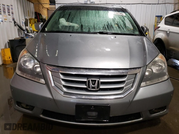 2008 Honda Odyssey Touring z VIN 5FNRL38918B104500, wystawiony jako Copart lot #47816145 z przebiegiem 262 179 mil mil oraz Szkoda całkowita • Salvage title. Historia ofert i sprzedaży dostępna na DreamBid. Obrazek 5.