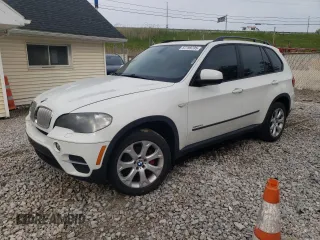 2011 BMW X5 35i z VIN 5UXZV4C53BL742870, wystawiony jako Copart lot #57799795 z przebiegiem 167 319 mil mil oraz Szkoda całkowita • Salvage title. Historia ofert i sprzedaży dostępna na DreamBid. Obrazek 1.
