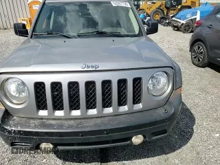2015 Jeep Patriot Sport with VIN 1C4NJRBB1FD176983, listed as a Copart auction lot 55927735 with 166,717 mi miles and Salvage title. Bid and sale history available at DreamBid. Image 13.