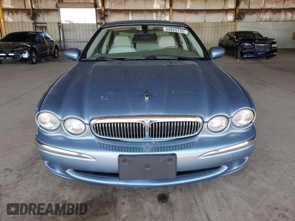 2004 Jaguar X-Type with VIN SAJEA51C14WE06627, listed as a Copart auction lot 54925735 with 107,756 mi miles and Clean Title. Bid and sale history available at DreamBid. Image 5.