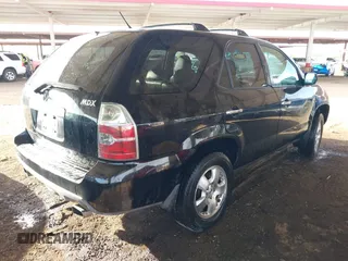 2004 Acura MDX with VIN 2HNYD18284H534118, listed as a IAAI auction lot 41563551 with 362,685 mi miles. Bid and sale history available at carsss.com. Image 4.