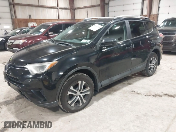 2017 Toyota RAV4 LE with VIN 2T3BFREV8HW571887, listed as a IAAI auction lot 41612815 with 100,742 mi miles and . Bid and sale history available at DreamBid. Image 2.