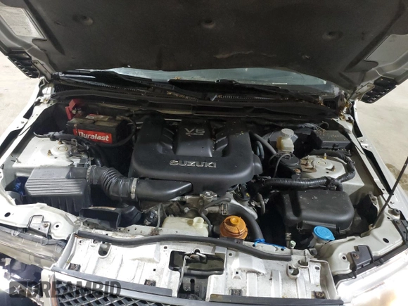 2006 Suzuki Grand Vitara Premium z VIN JS3TD943164103120, wystawiony jako Copart lot #56132585 z przebiegiem 143 313 mil mil oraz Szkoda całkowita • Salvage title. Historia ofert i sprzedaży dostępna na DreamBid. Obrazek 12.