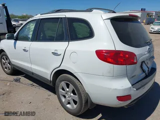 2009 Hyundai Santa Fe SE with VIN 5NMSH13E09H265061, listed as a IAAI auction lot 41851575 with 136,460 mi miles. Bid and sale history available at carsss.com. Image 3.