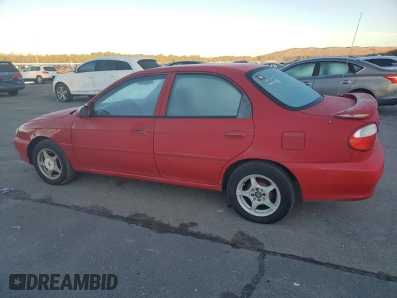 2001 Kia Sephia z VIN KNAFB121715066725, wystawiony jako Copart lot #86552964 z przebiegiem 76 915 mil mil oraz Tytuł czysty. Historia ofert i sprzedaży dostępna na DreamBid. Obrazek 2.