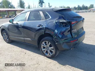 2023 Mazda CX-30 S Select with VIN 3MVDMBBM4PM558831, listed as a IAAI auction lot 42432750 with 12,468 mi miles and . Bid and sale history available at DreamBid. Image 3.