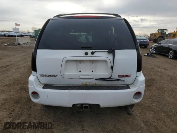 2004 GMC Envoy SLT with VIN 1GKDT13S442158660, listed as a Copart auction lot 50190045 with 0 mi miles and Salvage Title. Bid and sale history available at carsss.com. Image 6.