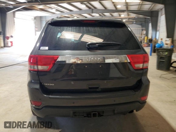 2011 Jeep Grand Cherokee Laredo with VIN 1J4RS4GG9BC517059, listed as a Copart auction lot 52704705 with 120,171 mi miles and Salvage Title. Bid and sale history available at DreamBid. Image 6.