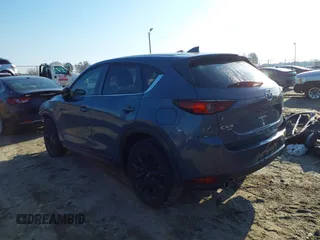 2021 Mazda CX-5 Touring with VIN JM3KFBCM8M0452700, listed as a IAAI auction lot 41490600 with 37,865 mi miles. Bid and sale history available at carsss.com. Image 3.