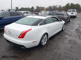 2017 Jaguar XJ with VIN SAJWA2G73H8W04310, listed as a IAAI auction lot 40914491 with 62,102 mi miles. Bid and sale history available at carsss.com. Image 4.