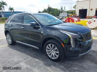 2023 Cadillac XT4 FWD Premium Luxury with VIN 1GYFZCR44PF170452, listed as a IAAI auction lot 42084960 with 22,212 mi miles. Bid and sale history available at carsss.com. Image 1.