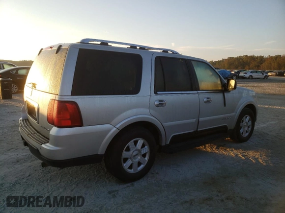 2004 Lincoln Navigator Luxury with VIN 5LMFU27R54LJ13826, listed as a Copart auction lot 74139834 with 167,370 mi miles and Salvage Title. Bid and sale history available at carsss.com. Image 3.