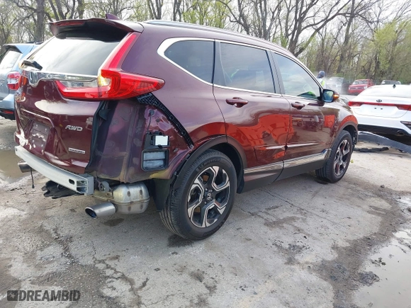 2017 Honda CR-V Touring with VIN 5J6RW2H95HL074264, listed as a IAAI auction lot 41974804 with 94,923 mi miles. Bid and sale history available at carsss.com. Image 4.