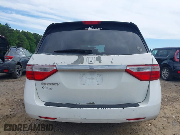 2012 Honda Odyssey LX z VIN 5FNRL5H28CB096385, wystawiony jako IAAI lot #42304664 z przebiegiem 105 010 mil mil oraz . Historia ofert i sprzedaży dostępna na DreamBid. Obrazek 16.