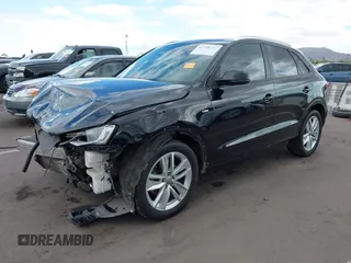 2018 Audi Q3 Premium z VIN WA1BCCFS8JR006212, wystawiony jako IAAI lot #42208285 z przebiegiem 96 571 mil mil oraz . Historia ofert i sprzedaży dostępna na DreamBid. Obrazek 2.