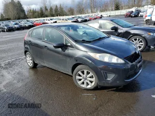 2012 Ford Fiesta SE z VIN 3FADP4EJ4CM183237, wystawiony jako Copart lot #48825605 z przebiegiem 92 798 mil mil oraz Szkoda całkowita • Salvage title. Historia ofert i sprzedaży dostępna na DreamBid. Obrazek 4.