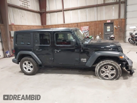 2019 Jeep Wrangler Unlimited Sport Altitude with VIN 1C4HJXDGXKW505396, listed as a IAAI auction lot 42039985 with 146,178 mi miles and . Bid and sale history available at DreamBid. Image 13.