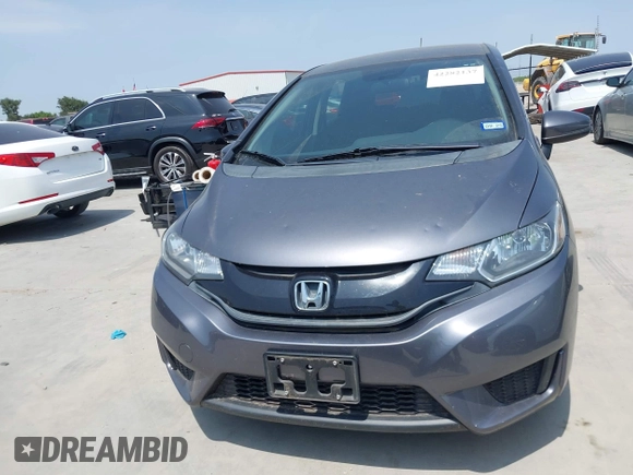 2015 Honda Fit LX with VIN 3HGGK5H55FM724750, listed as a IAAI auction lot 42282137 with 32,696 mi miles and . Bid and sale history available at DreamBid. Image 12.