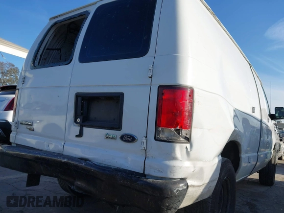 2014 Ford Econoline Cargo Commercial with VIN 1FTNE1EW4EDA92742, listed as a IAAI auction lot 41702320 with 207,179 mi miles and . Bid and sale history available at DreamBid. Image 6.