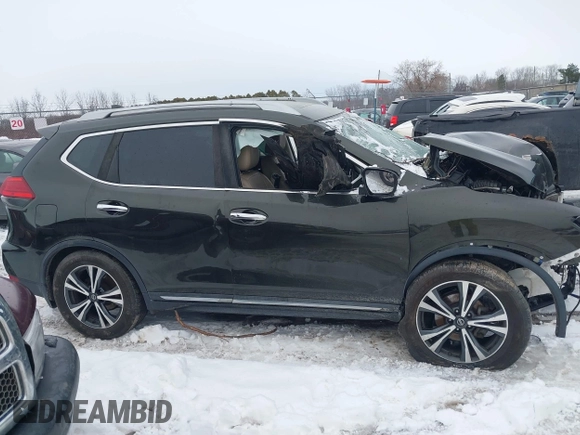2017 Nissan Rogue SL with VIN 5N1AT2MT0HC813372, listed as a IAAI auction lot 41215661 with 109,101 mi miles and . Bid and sale history available at DreamBid. Image 13.