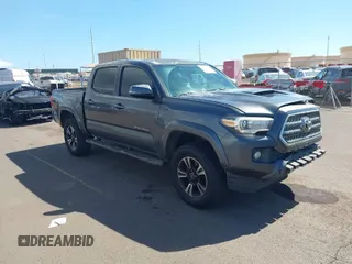 2017 Toyota Tacoma SR5 with VIN 3TMAZ5CN1HM029949, listed as a IAAI auction lot 41425721 with 128,089 mi miles. Bid and sale history available at carsss.com. Image 1.