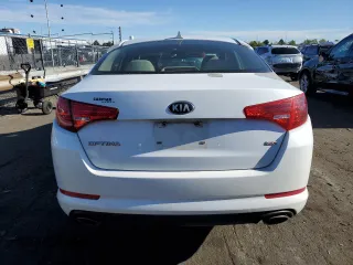 2013 Kia Optima LX z VIN 5XXGM4A71DG182351, wystawiony jako Copart lot #53869324 z przebiegiem 125 893 mil mil oraz Szkoda całkowita • Salvage title. Historia ofert i sprzedaży dostępna na DreamBid. Obrazek 6.