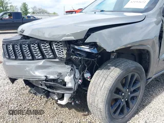 2021 Jeep Grand Cherokee Laredo E with VIN 1C4RJFAG4MC700384, listed as a IAAI auction lot 42192672 with 54,525 mi miles and . Bid and sale history available at DreamBid. Image 6.