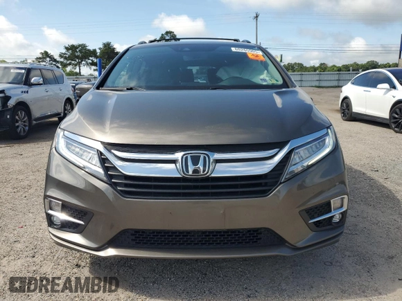 2019 Honda Odyssey Elite z VIN 5FNRL6H90KB027207, wystawiony jako Copart lot #60265905 z przebiegiem 69 313 mil mil oraz Szkoda całkowita • Salvage title. Historia ofert i sprzedaży dostępna na DreamBid. Obrazek 5.