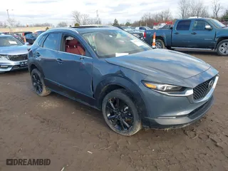 2022 Mazda CX-30 2.5 S Preferred Package with VIN 3MVDMBCL3NM422497, listed as a IAAI auction lot 41236220 with 57,752 mi miles. Bid and sale history available at carsss.com. Image 1.